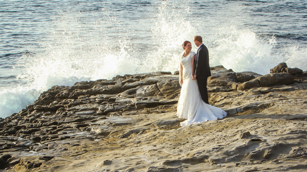 Bride and groom at the beach. San Diego Temple Wedding