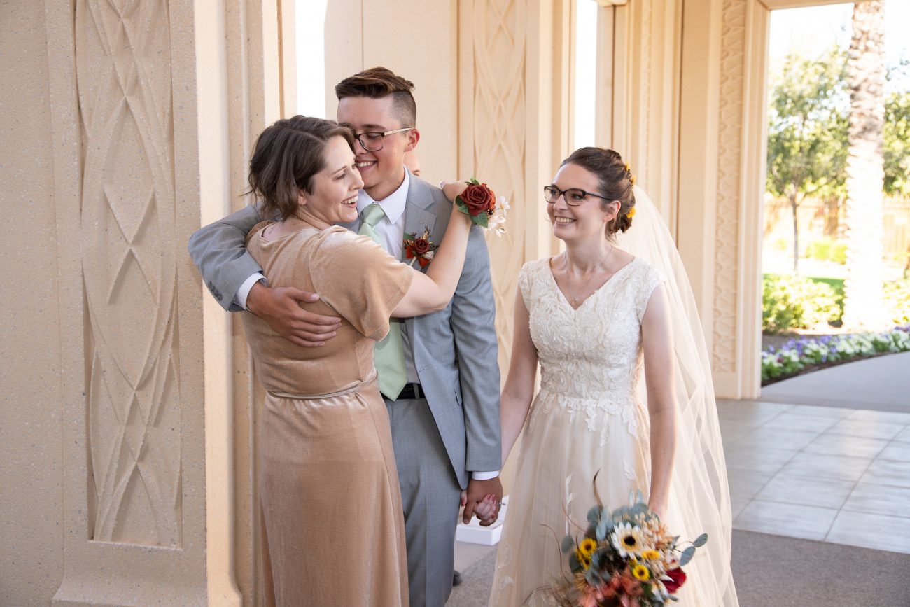 Groom hugging mom after wedding at the Gilbert Arizona Temple