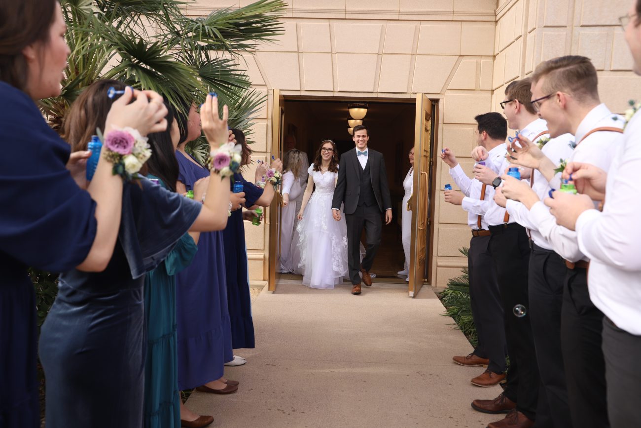 Bride and groom exiting the Mesa Arizona Temple