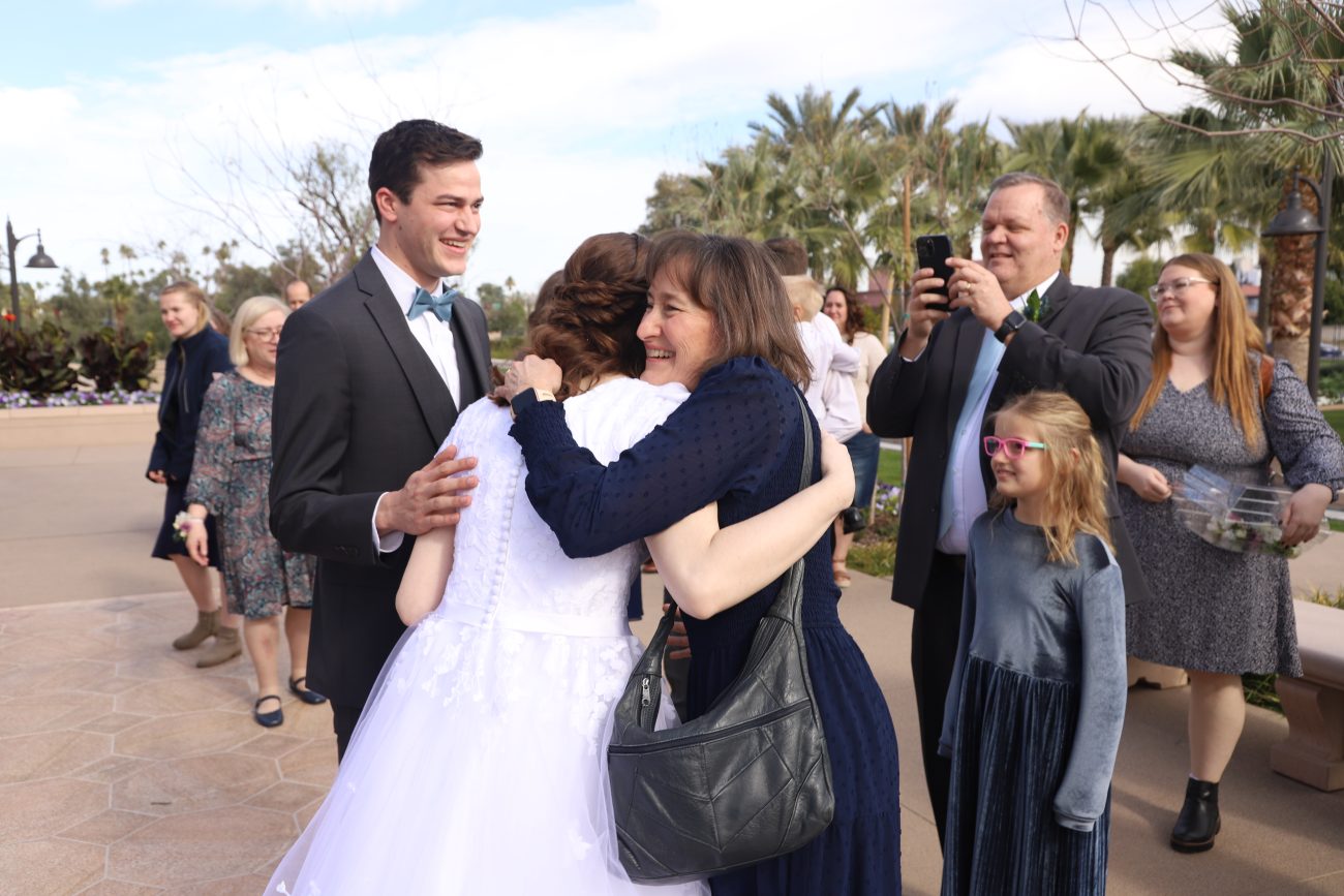 Bride hugging family at the Mesa Arizona Temple