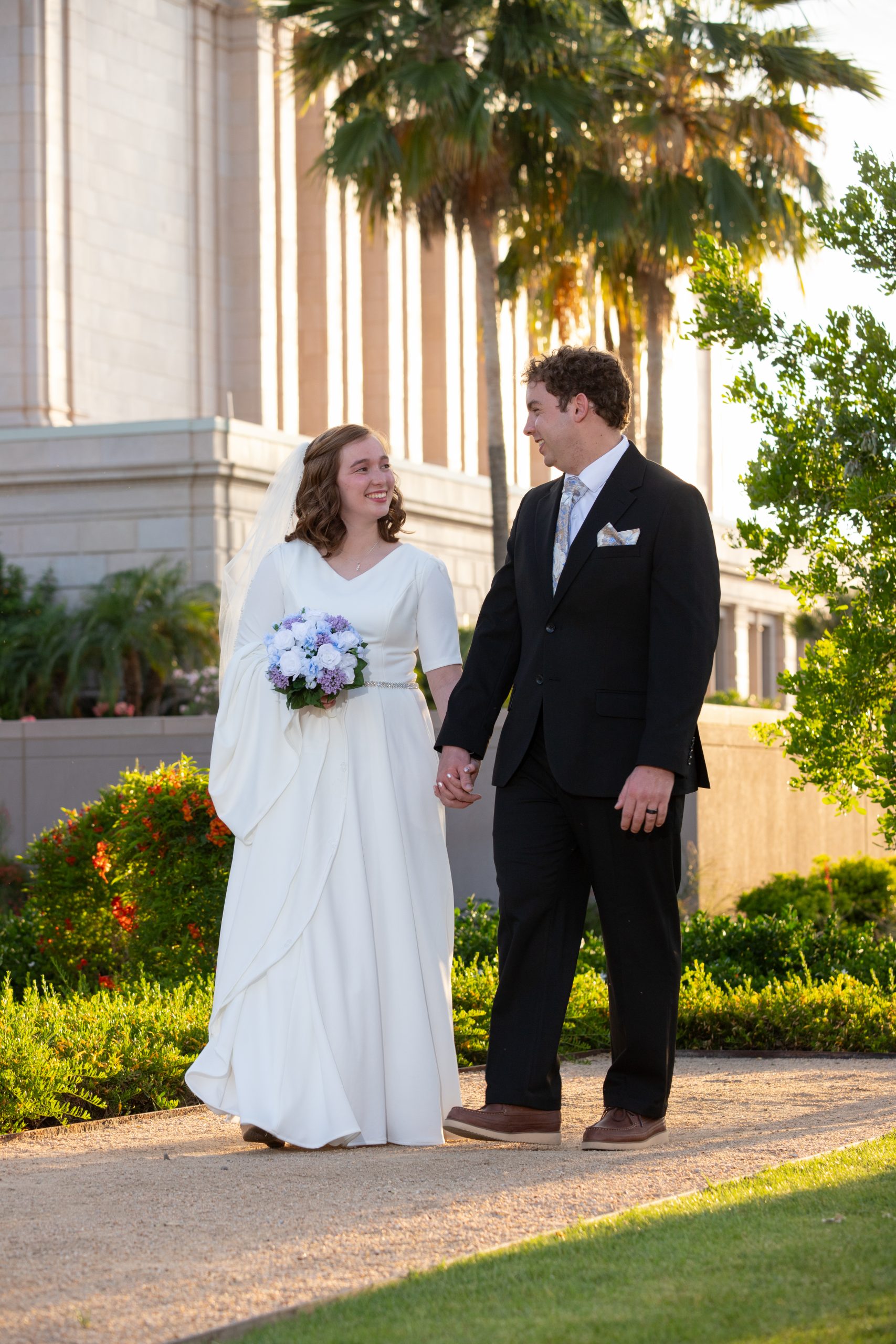 Bride and Groom walking at the Mesa Arizona Temple
