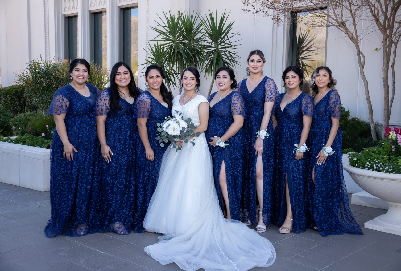 Bride at the Tucson Arizona Temple after the wedding with her bridesmaids.