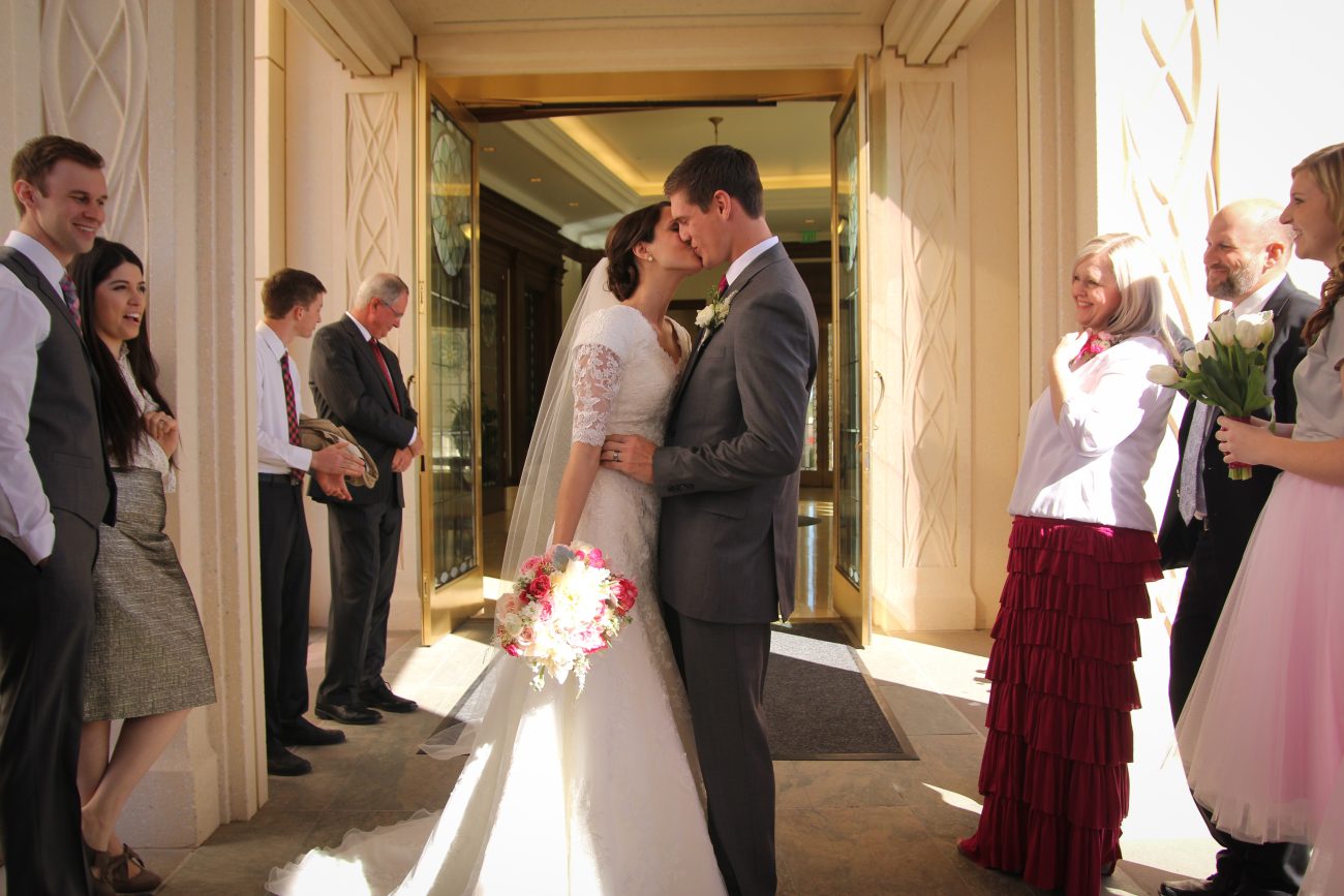 Bride and groom first kiss photo at the Gilbert Arizona Temple