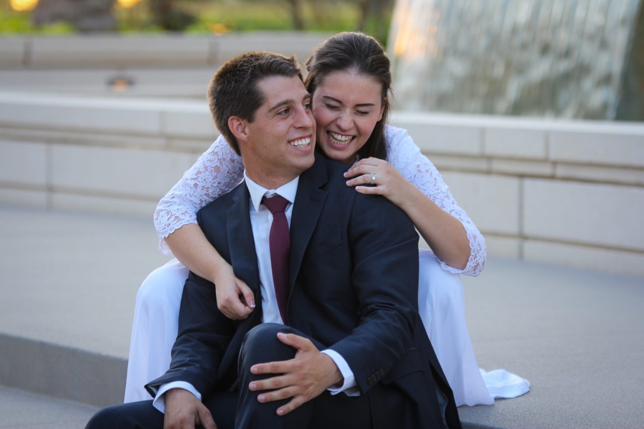 Bride and groom laughing at the Gilbert Arizona Temple